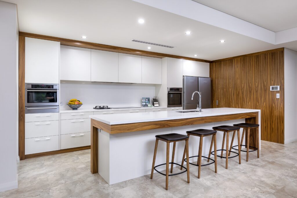 standing kitchen sink and chairs